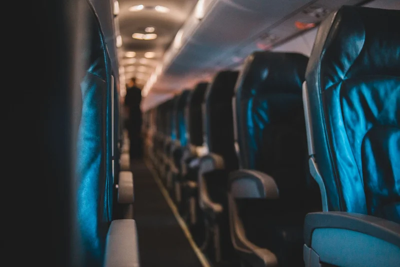 Lie-flat business-class seats inside a long-haul passenger aircraft